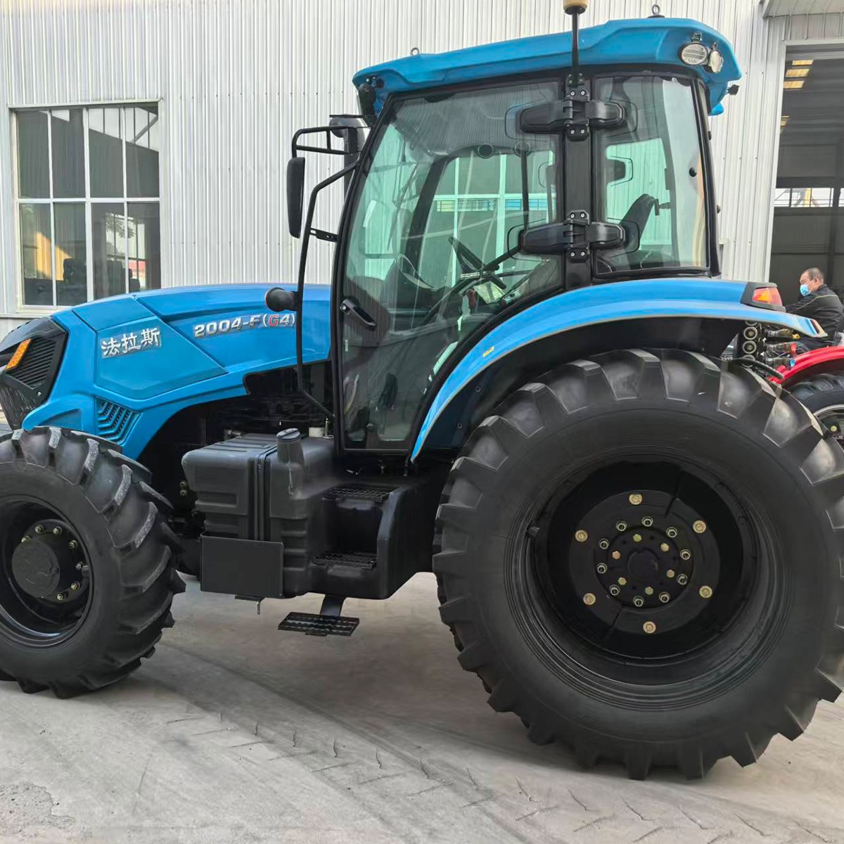 Tractor 2004 Farm Tractor with Heavy-Duty Tires and Reliable Engine