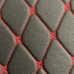 Quilted car rear compartment mat