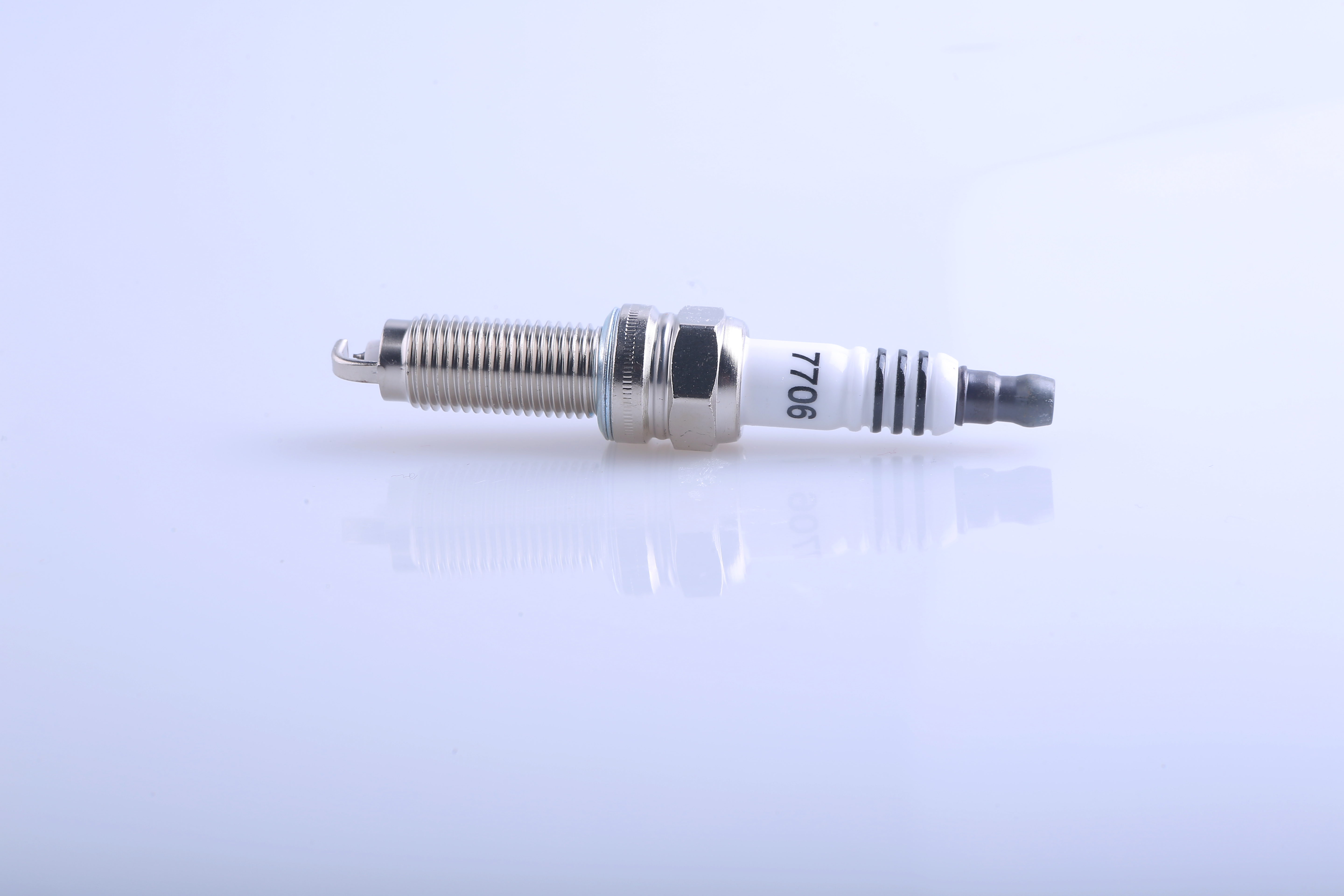 Spark Plug Model 7706 High-Quality Engine Spare Part