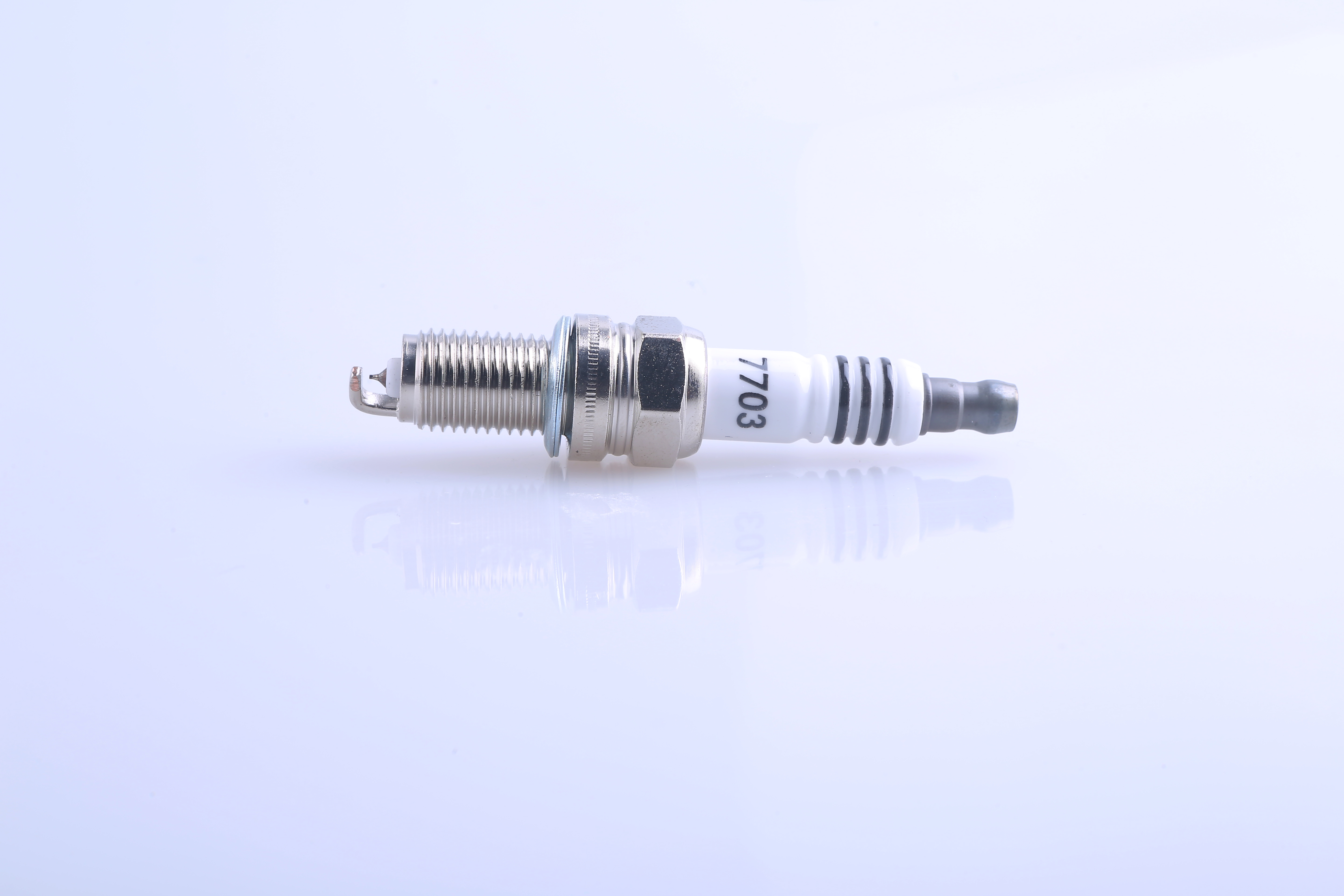 Spark Plug Model 7703 High-Quality Engine Spare Part