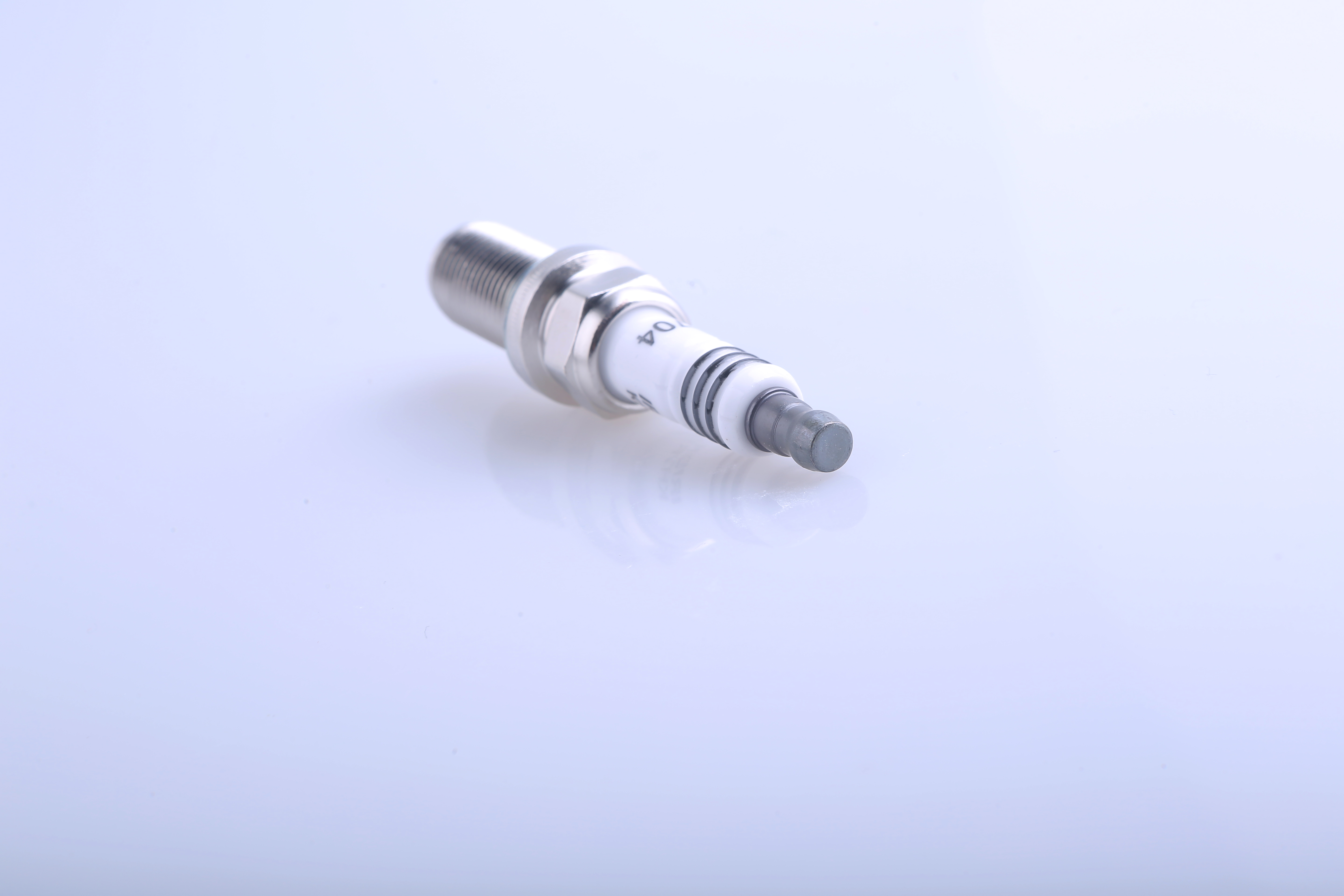 Spark Plug Model 7704 High-Quality Engine Spare Part