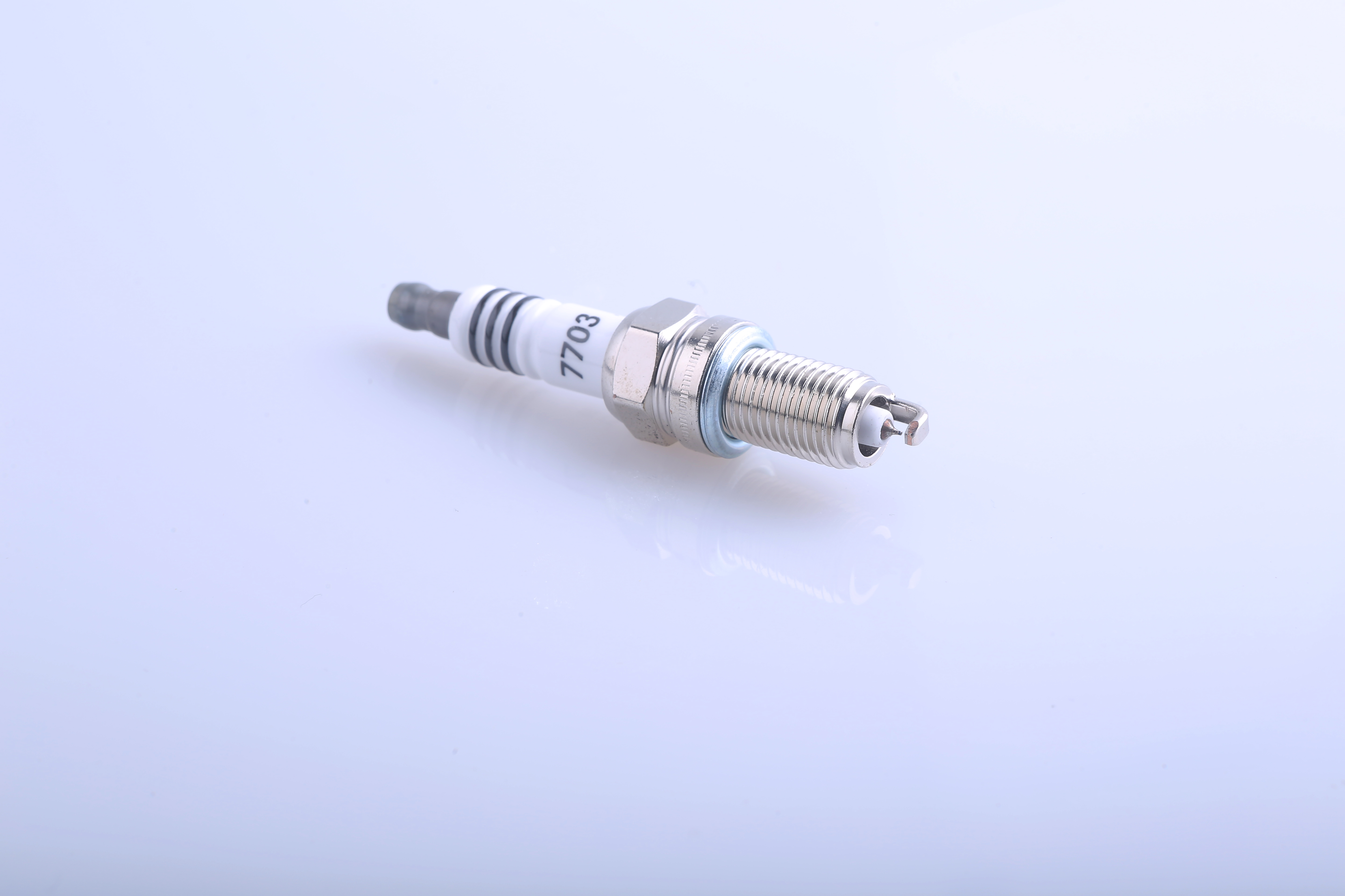 Spark Plug Model 7703 High-Quality Engine Spare Part