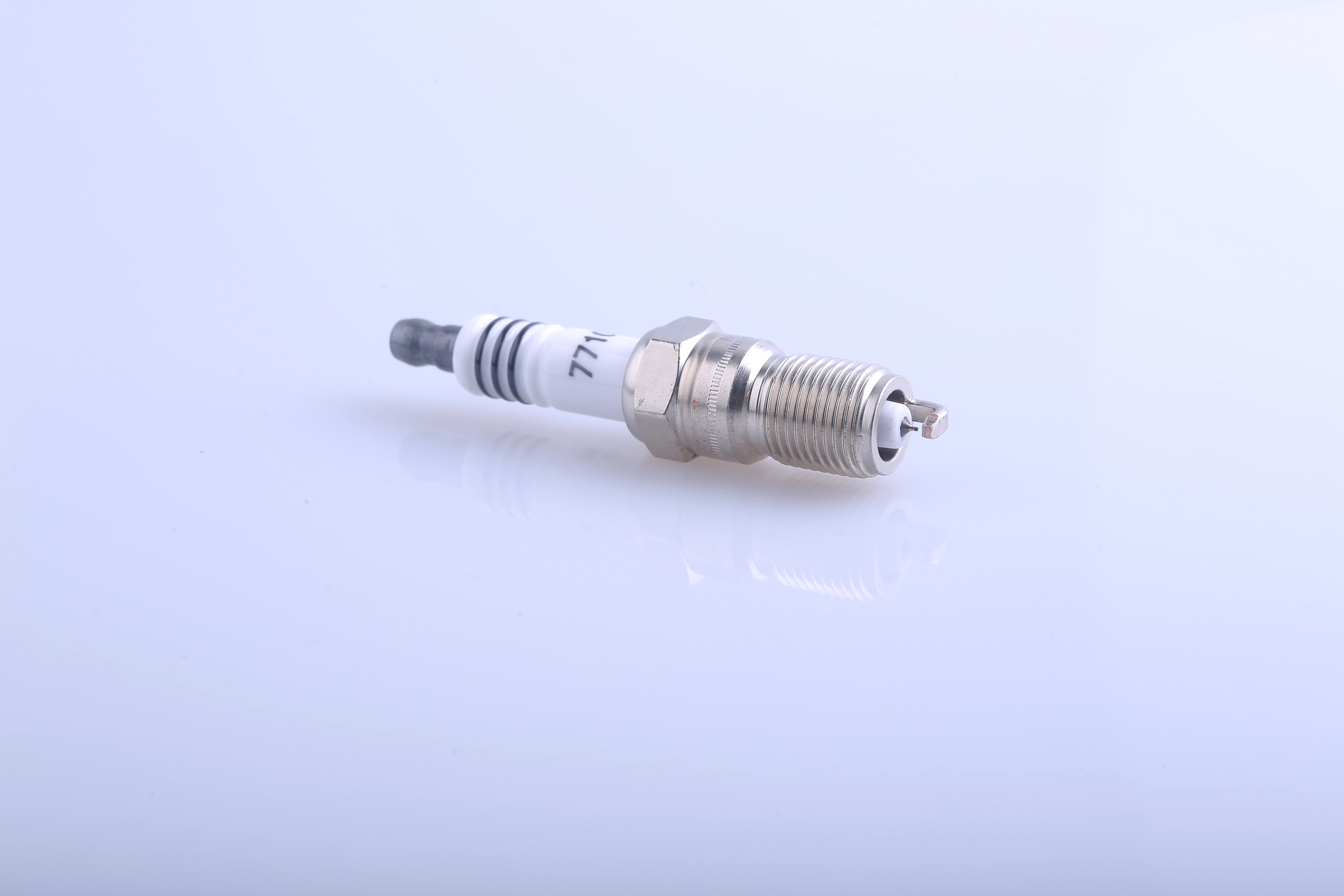 Spark Plug Model 7710 High-Quality Engine Spare Part