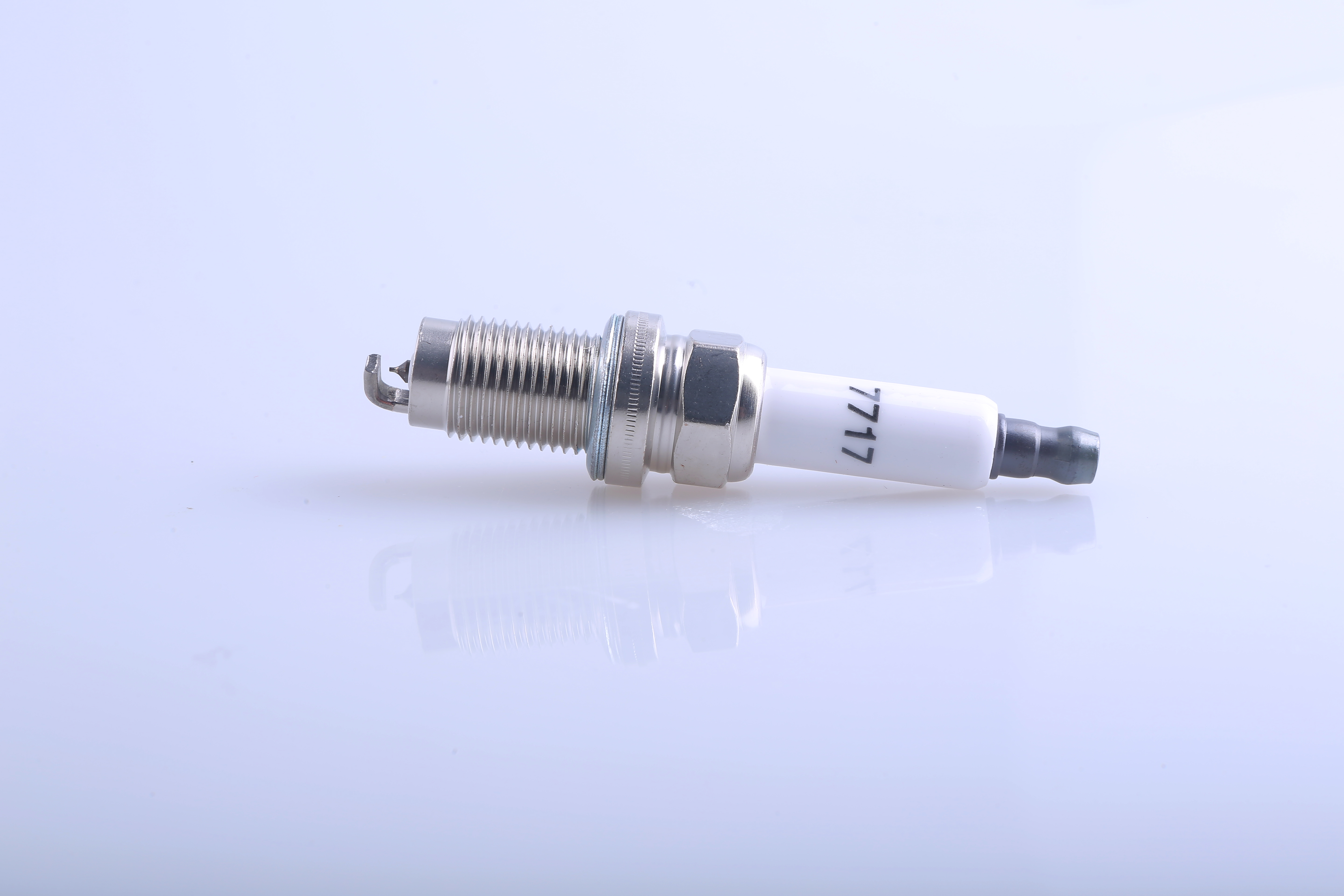 Spark Plug Model 7717 High-Quality Engine Spare Part