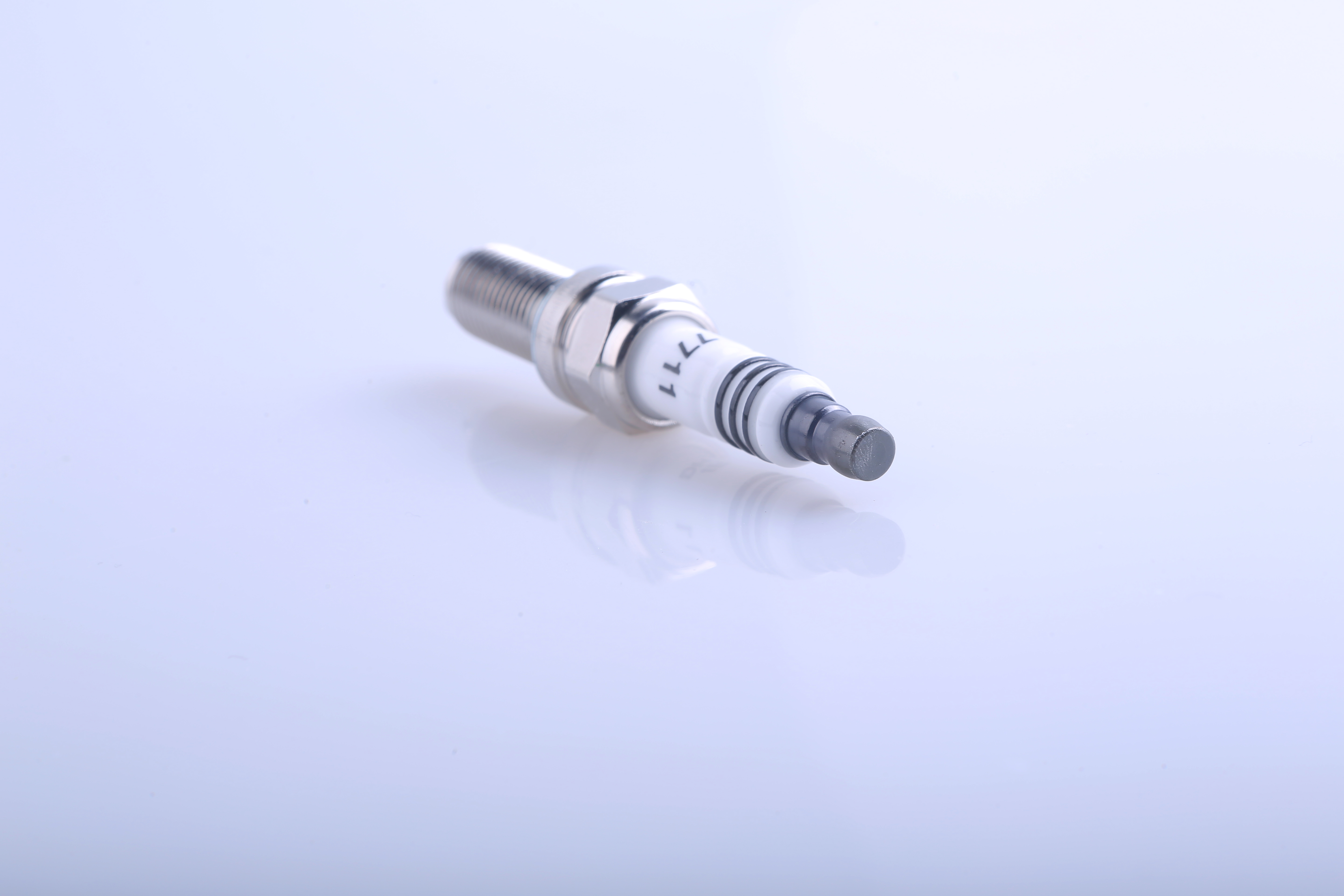 Spark Plug Model 7711 High-Quality Engine Spare Part