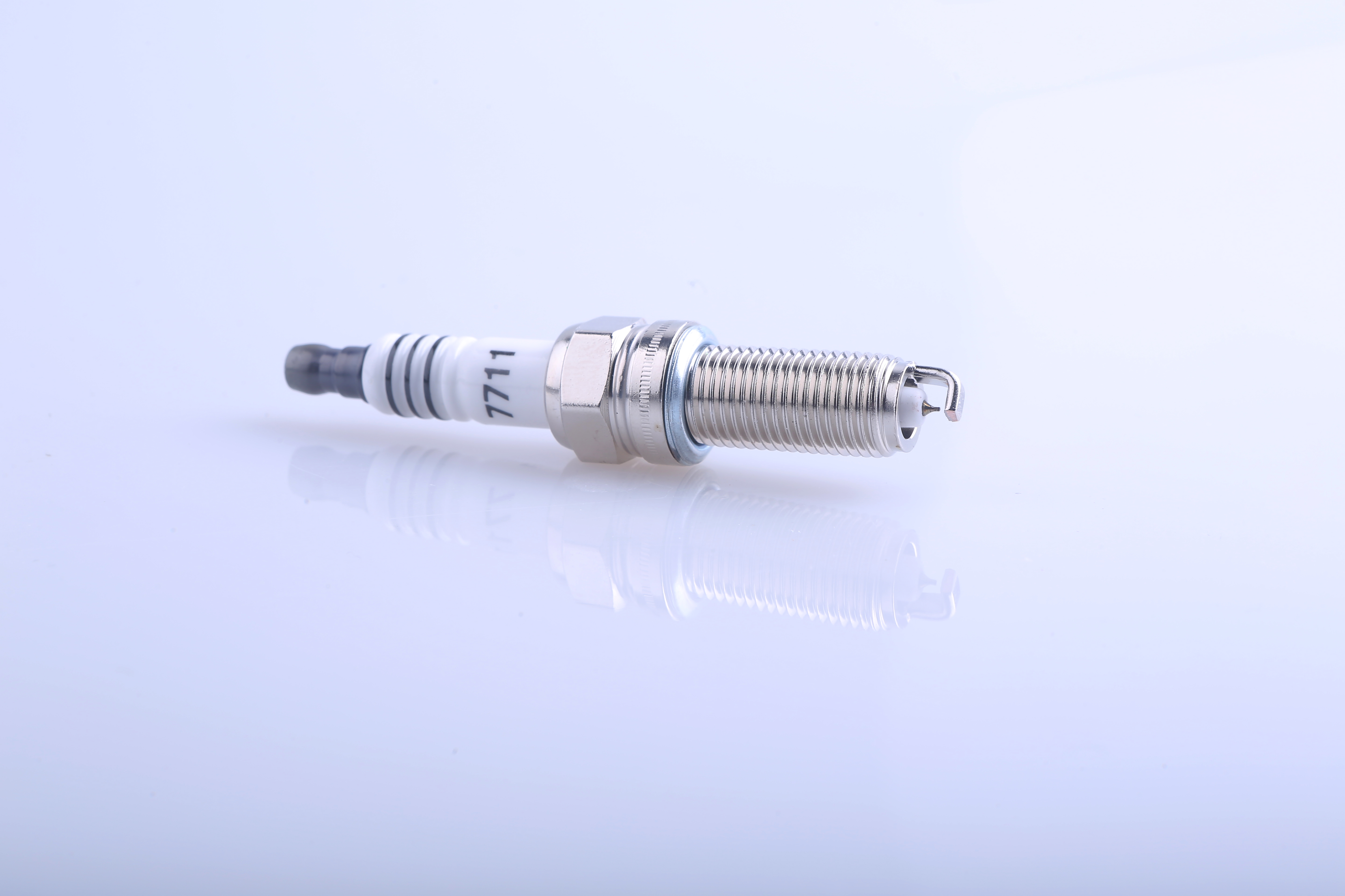 Spark Plug Model 7711 High-Quality Engine Spare Part