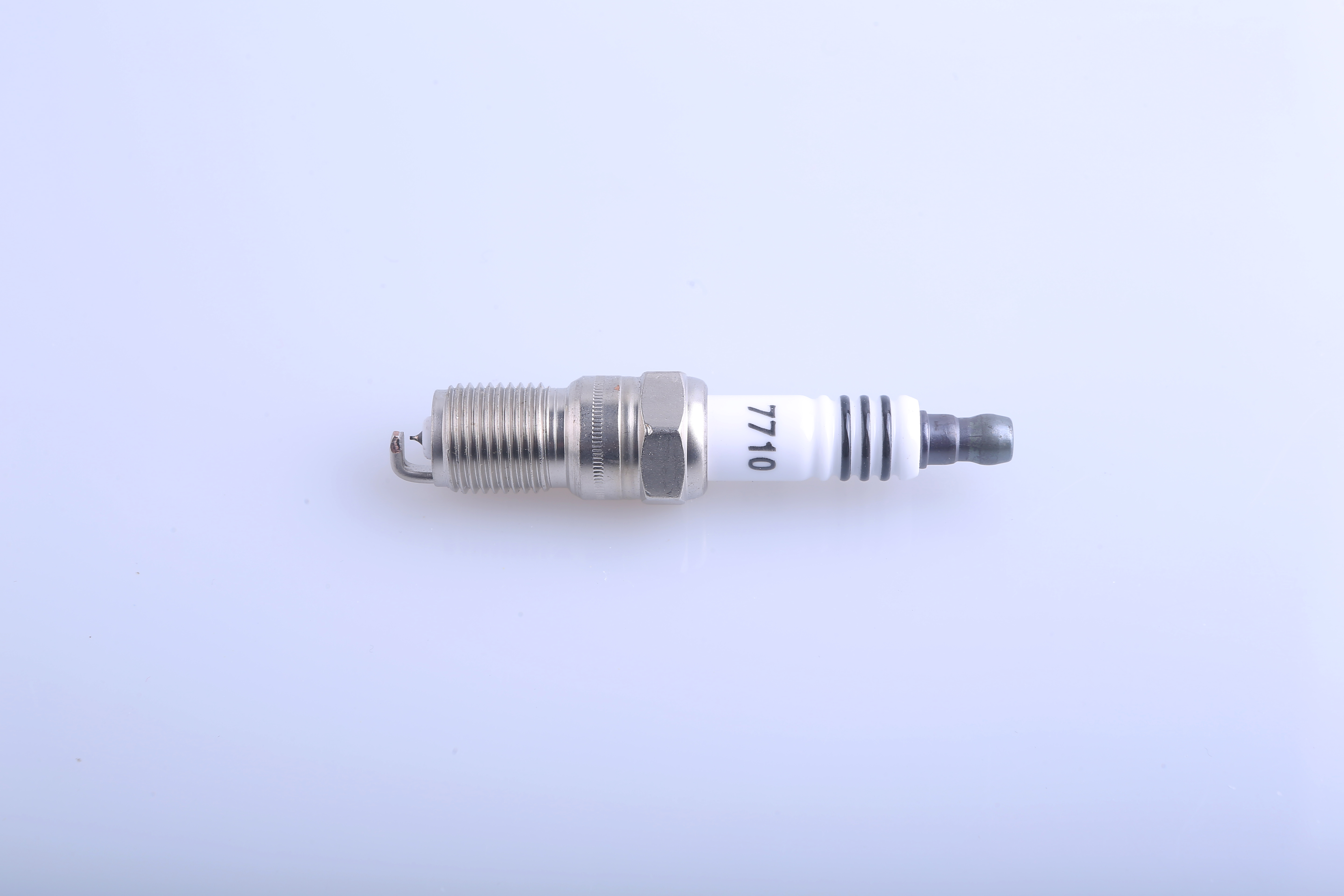 Spark Plug Model 7710 High-Quality Engine Spare Part