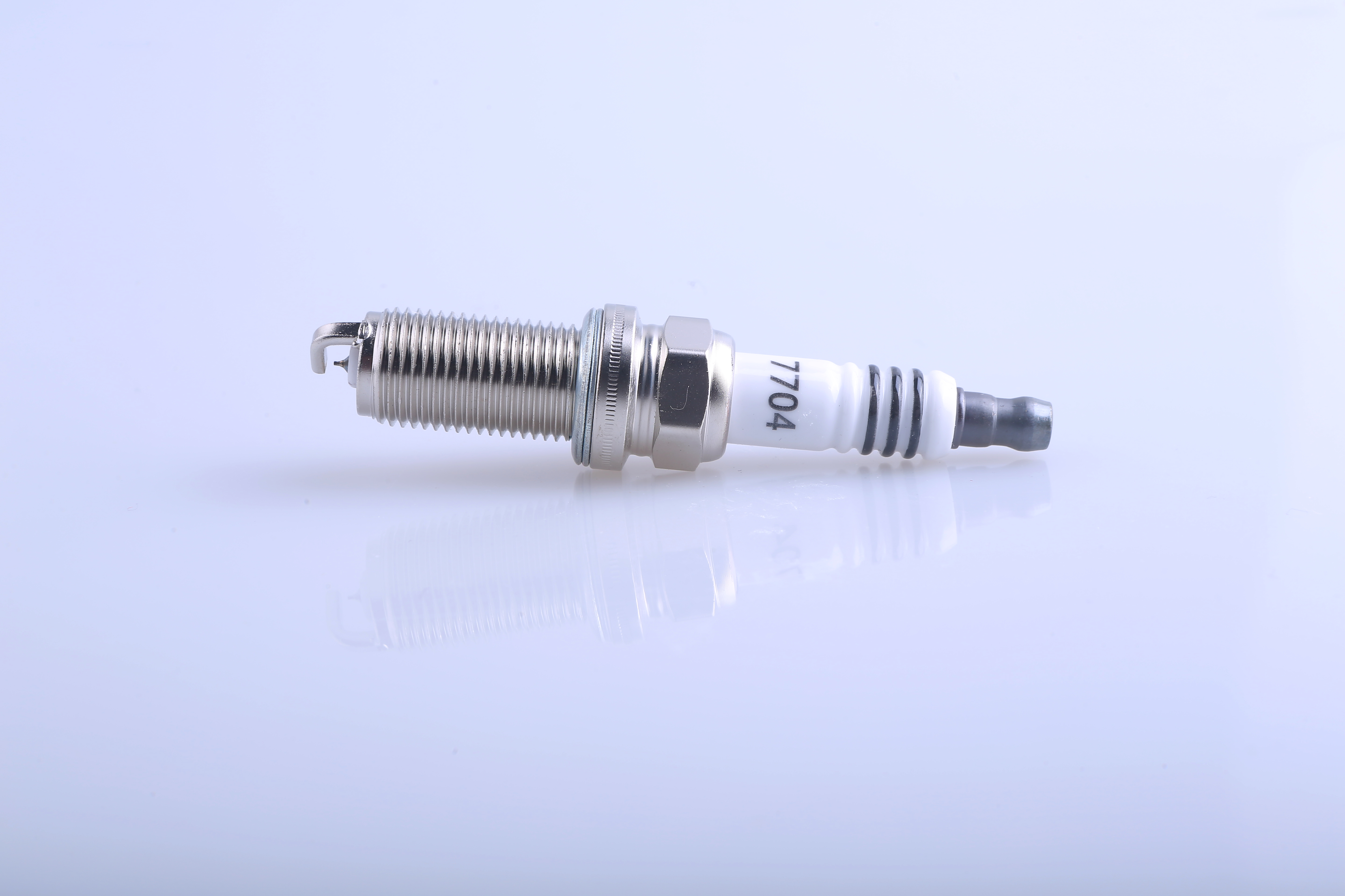 Spark Plug Model 7704 High-Quality Engine Spare Part